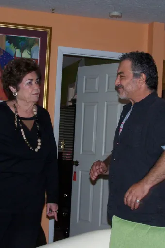 Anna receives direction from producer Andy Papadopoules