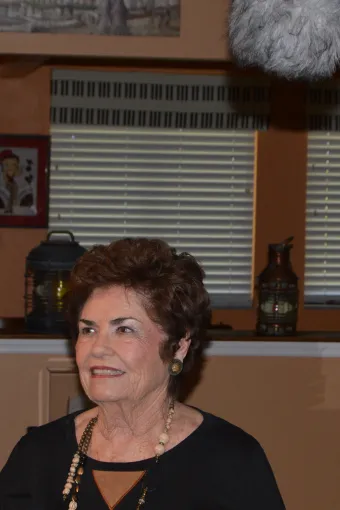 Anna watches filming setup for "World's Most Evil Killers"