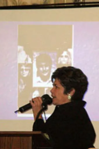 Anna Flowers speaks at a luncheon