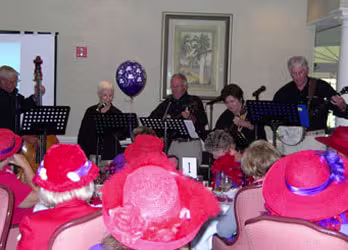 Red Hat Luncheon - Salty Dog folk group singing Ballad
